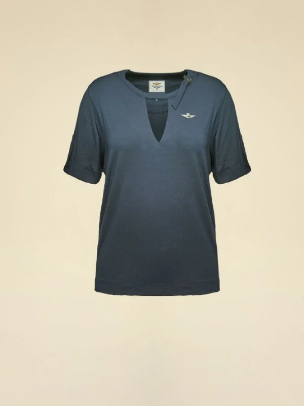 CAMISETA PICO MANGA CORTA BOTON Y APLIQUE