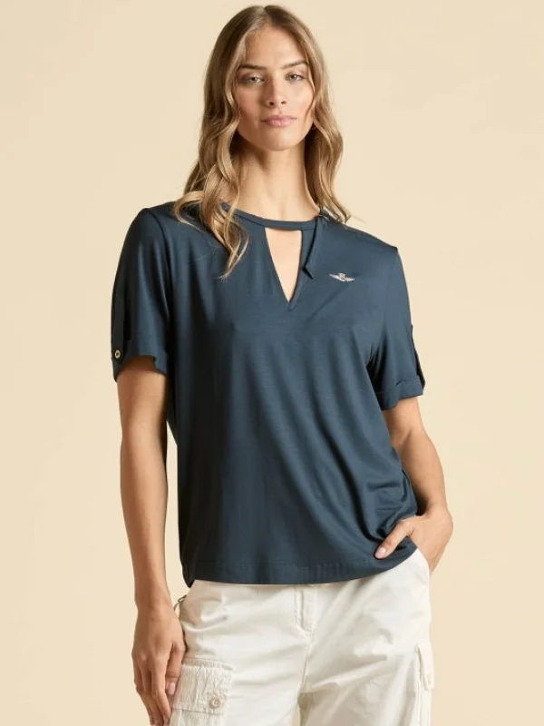 CAMISETA PICO MANGA CORTA BOTON Y APLIQUE